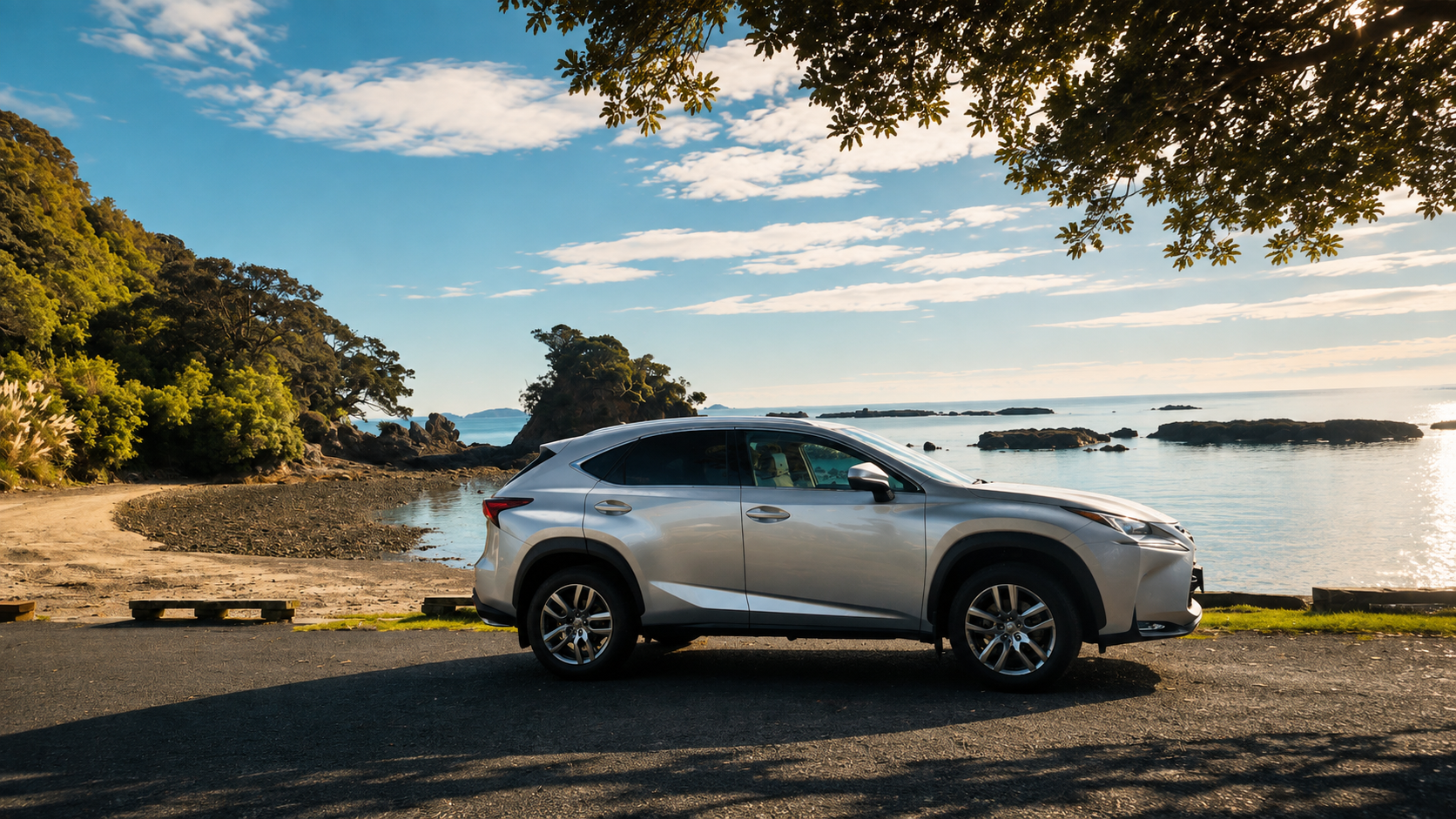 Private Lexus touring vehicle parked at a Waiheke bay